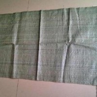 sell linyi hemei cheap green pp woven garbage bags for construction waste size 55x95cm