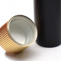 Child proof round glass tube with cork screw lids flat tube gold and silver lid label